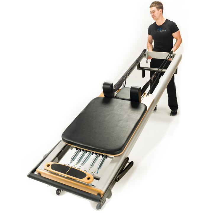 Peak Pilates Fit™ Reformer with Large Footplate  The fit™ reformer includes a locking foot bar, a four position one-hand gear bar,