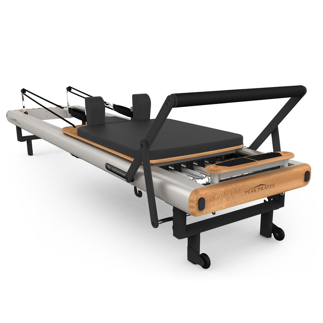 Peak Pilates Fit™ Reformer with Large Footplate  The fit™ reformer includes a locking foot bar, a four position one-hand gear bar,